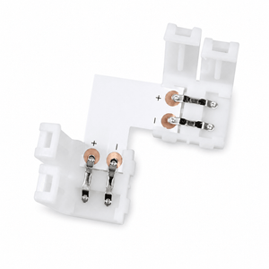 Solderless L-shape snap connector for 3528 LED strip lights, featuring copper contacts and clip design.