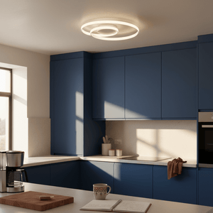 White round LED ceiling light installed in a modern kitchen with blue cabinetry.