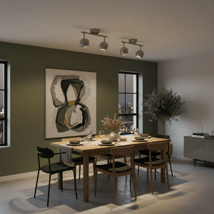 Modern 2-light GU10 ceiling spotlight illuminating a dining table with an abstract painting on the wall.