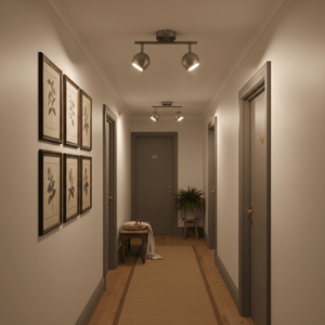 A modern 2-light GU10 ceiling spotlight illuminating a stylish hallway with framed artwork.