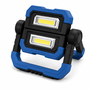 Blue and black rechargeable work light on a white background