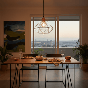 Stylish dining setup featuring the Tarbes Copper Pendant Light above a wooden table with food and drinks.