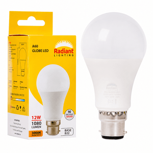LED bulb with B22 base in packaging, showcasing warm white light and energy efficiency.