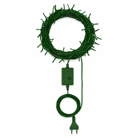 Green string light coil with plug on a white background