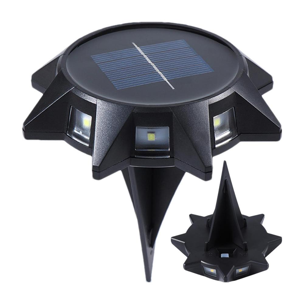 Solar-powered outdoor light with a solar panel on top, on a white background