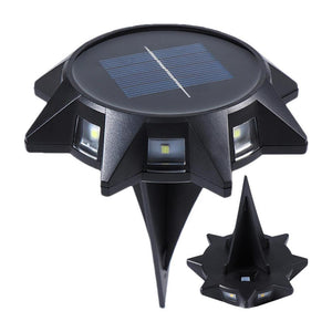 Solar-powered outdoor light with a solar panel on top, on a white background