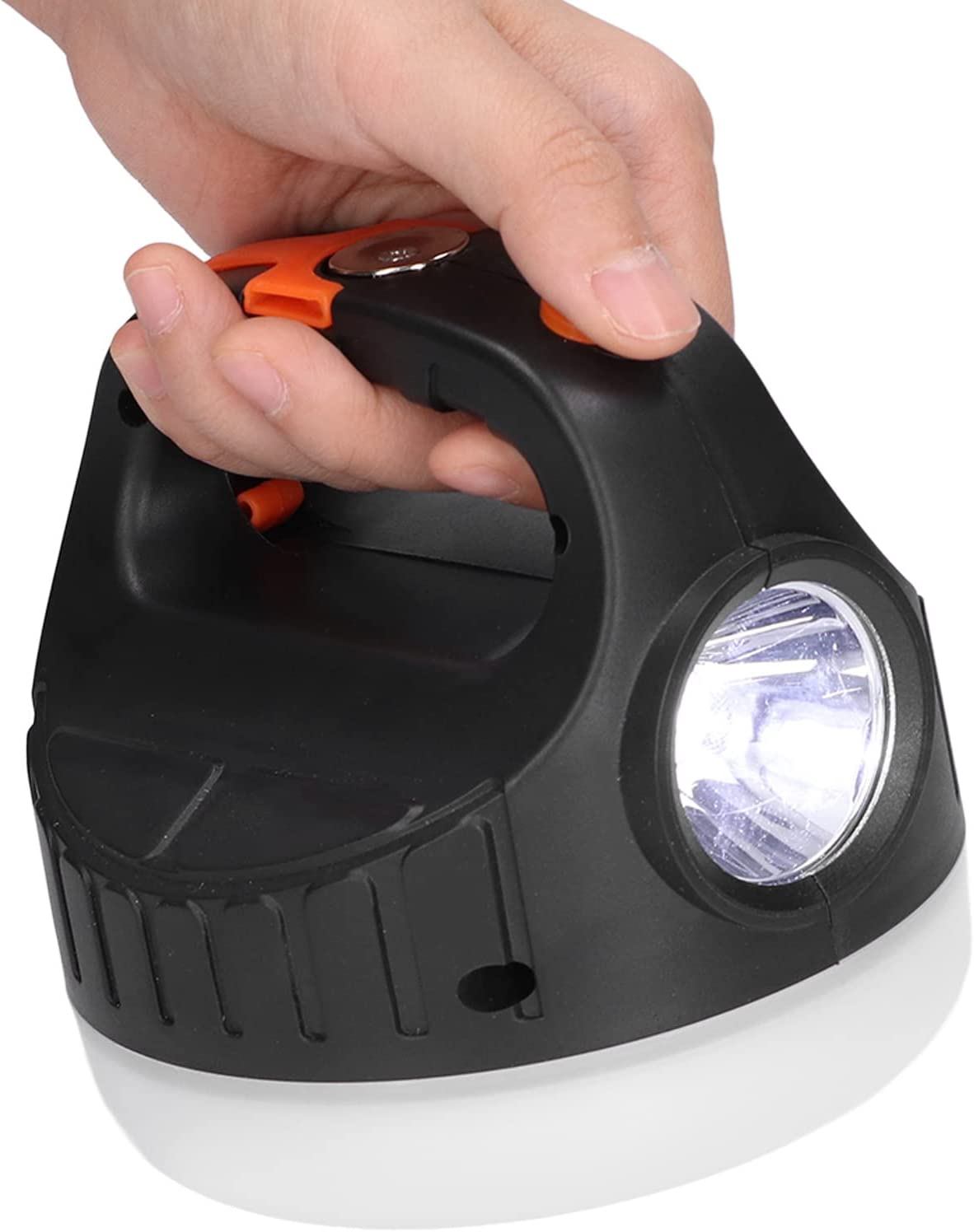 Carry ball torch held by handle with front light switched on