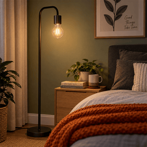 4W Dimmable Clear A60 Filament LED Bulb – E27, 2700K Warm White shown installed in a lifestyle setting