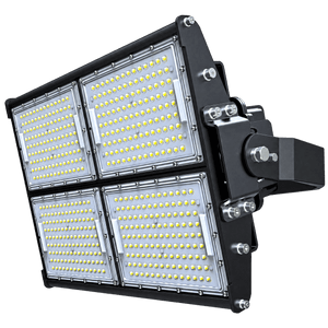 LED floodlight with four rectangular panels, black metal finish, and multiple yellow LED bulbs visible.