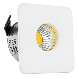 Square white LED downlight with a circular lens, featuring a yellow center and clear reflective edges.