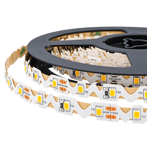 LED striplight on a black spool, featuring a zigzag design with yellow and white LED lights on a flexible circuit board.