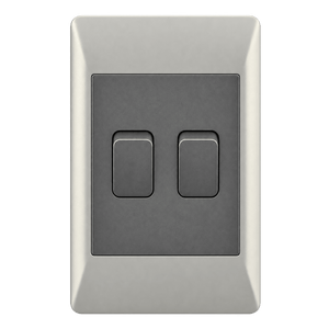 A rectangular switch plate with a brushed metal finish, featuring two black levers in a vertical arrangement.