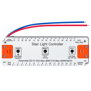 Silver rectangular stair light controller with orange buttons, labeled functions, and red and blue wires.