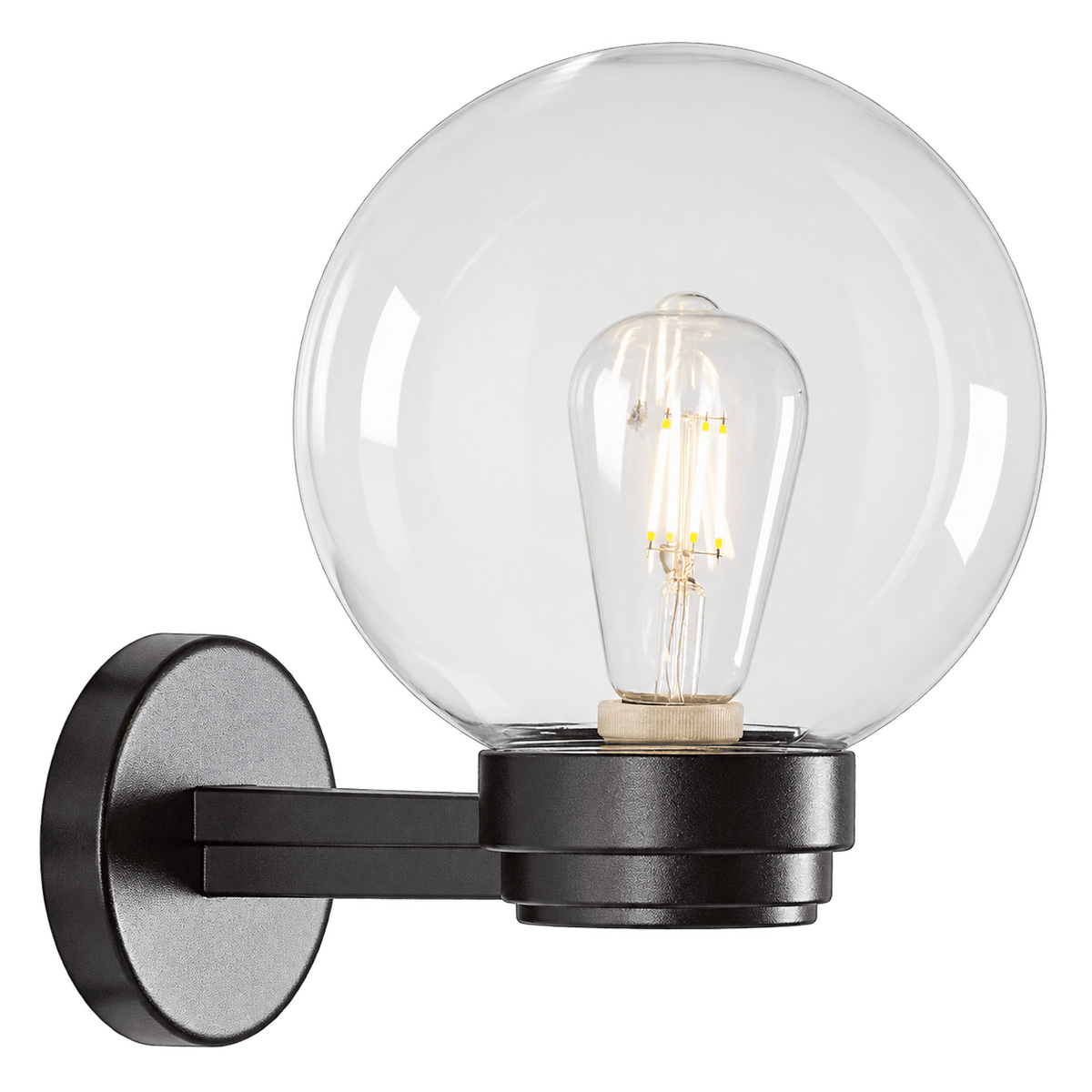 Black outdoor wall light with clear glass globe showing an exposed filament bulb, on a black backplate, green background.