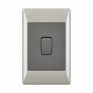 A rectangular, metallic light switch with a dark gray lever centered on a silver frame.