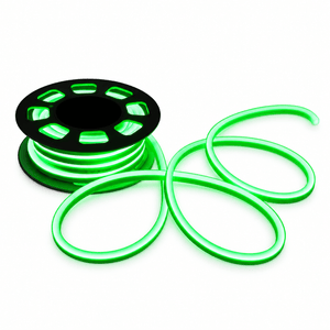 A black spool holds a flexible green neon strip, coiled and partially unspooled, against a white background.