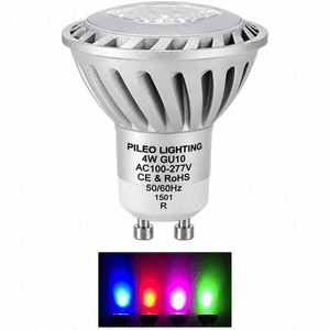 A silver LED downlight with a GU10 base, featuring a textured heat sink and a clear lens, above three colored light beams in blue, magenta, and green.
