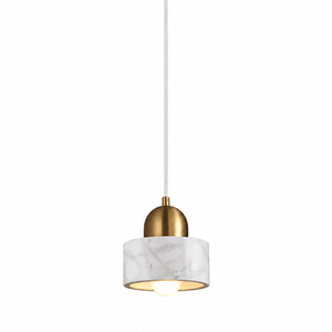 White marble pendant light with gold dome and visible bulb, hanging from a cord.
