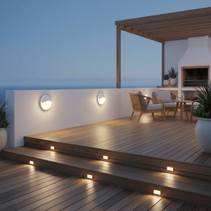 Outdoor setting featuring the 15W White Eyelid Wall Light mounted on a white wall, illuminating wooden steps.