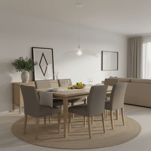 Stylish dining area featuring the Sensu Solo White Pendant Light above a wooden table set with fruit and tableware.
