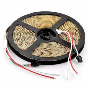 Close-up of a rolled LED smart strip light with exposed wiring and connectors.