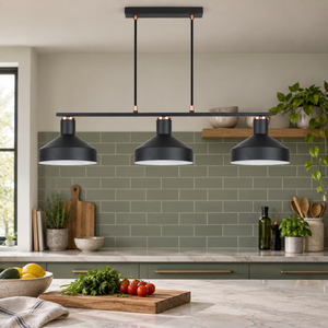 Orka black three light pendant above a sage prep counter