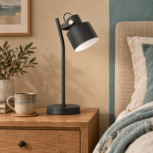 Orka black table lamp on a bedroom nightstand