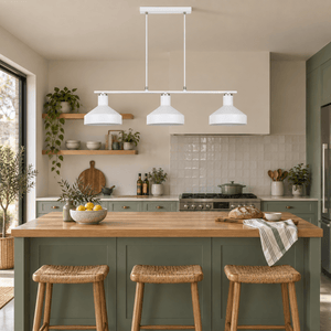 Orka white three light pendant above a sage kitchen island