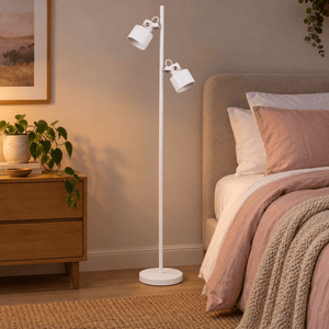 Orka white floor lamp by a clay pink bedroom