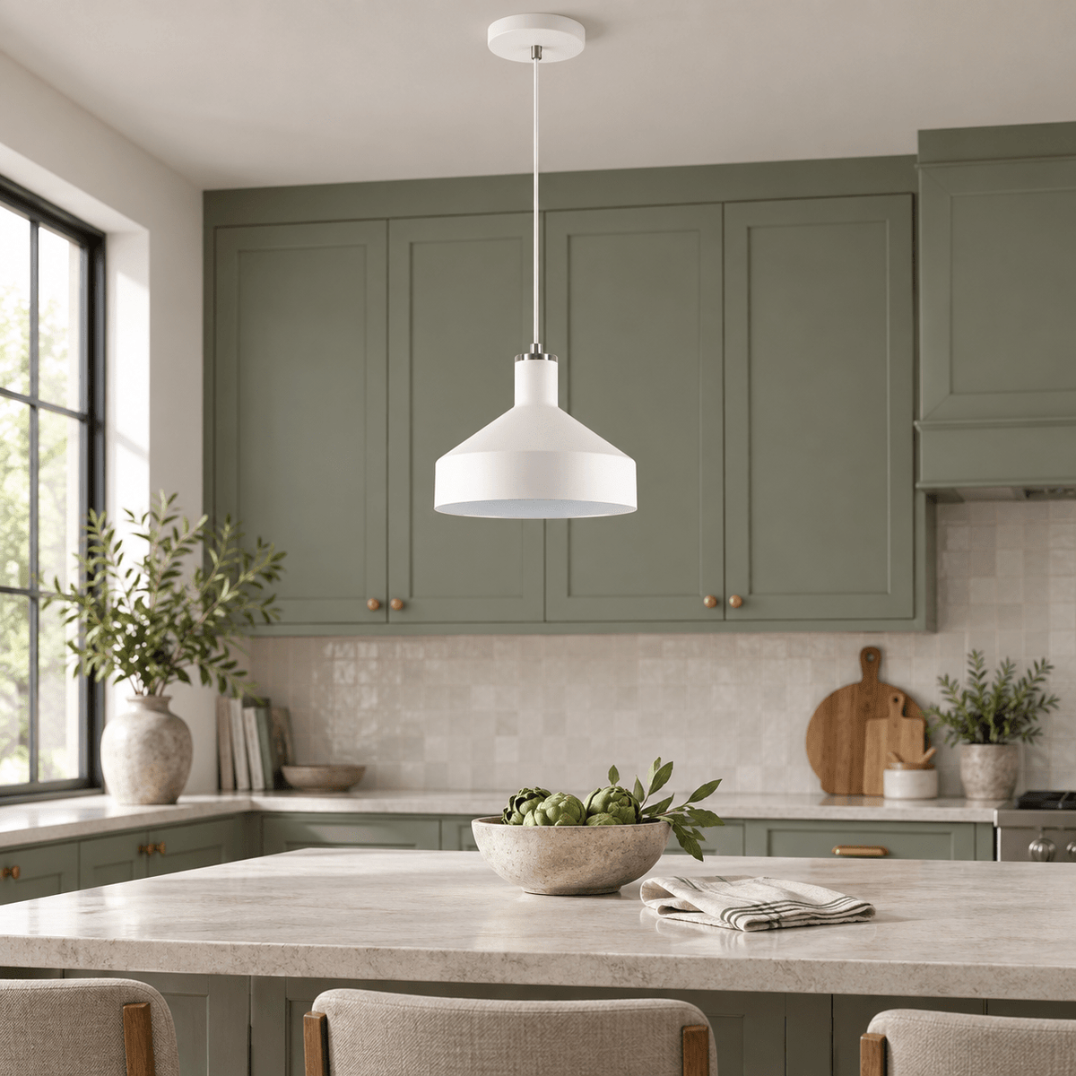 Orka white pendant above a sage kitchen island