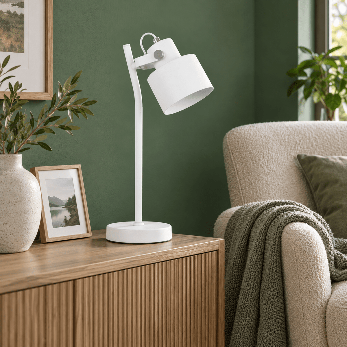 Orka white table lamp on a mineral green sideboard