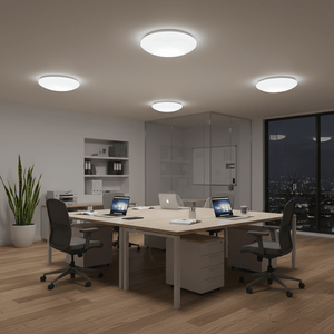 Modern office space featuring flush ceiling lights, wooden flooring, and sleek furniture.