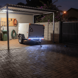 IP67 LED tail light strip installed on a trailer at night